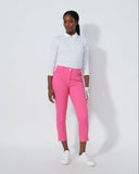 Person wearing a white shirt and pink pants on a white background