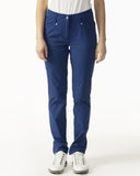 Person wearing blue pants and white sneakers on a white background