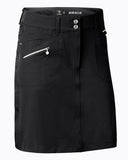 Black skirt with zippers and buttons on a white background