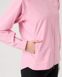 Pink jacket with a hand in the pocket on a light gray background