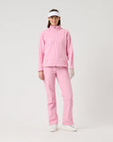Person wearing a pink outfit with a visor on a light gray background