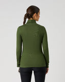 A woman viewed from the back wearing a ribbed olive green mock neck long-sleeve top and black leggings, standing against a light gray studio background.