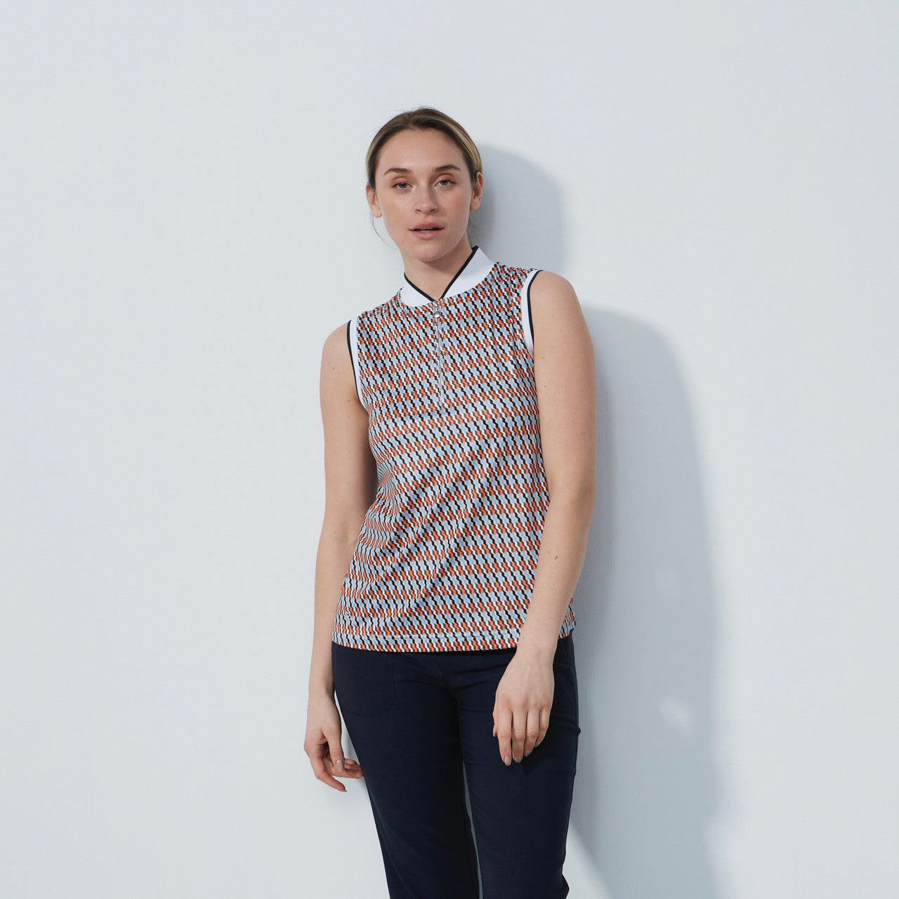 DS Delta Navy and Orange Print Sleeveless Top | Daily Sports USA