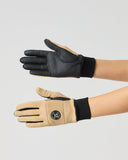 Daily Sports Ella Bark Gloves with Logo in camel tan – women's golf gloves showing camel suede back with circular logo patch and black leather palm, both sides view