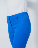 Blue pants on a mannequin against a white background