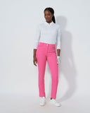 Person wearing a white shirt and pink pants on a white background