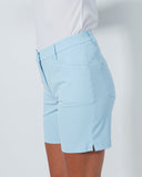 Light blue shorts worn by a person on a white background