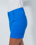 Blue shorts worn by a person on a white background