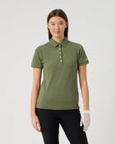 Person wearing a green polo shirt on a white background