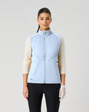 Daily Sports Allos Light Blue Hybrid Vest in soft powder blue – women's quilted front zip-up golf vest with fleece back panel, front view