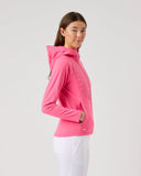 Woman wearing a pink hoodie on a light gray background