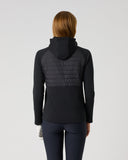 Daily Sports Allos Black Hybrid Jacket in black – women's hooded hybrid golf jacket showing quilted back panel and fleece sleeve detail, back view