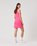 Woman wearing a pink dress on a white background