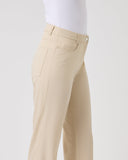 Beige pants worn by a person on a white background