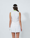 Person wearing a white tennis outfit with a green top on a white background