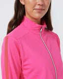 Person wearing a pink jacket with a white background