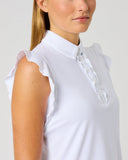 A close-up side view of a woman wearing a white sleeveless collared top with ruffled shoulder details and a ruffled placket, against a light gray studio background.