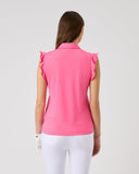 Woman wearing a pink sleeveless top and white pants on a light gray background