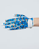 Glove with blue and orange pattern on a light gray background