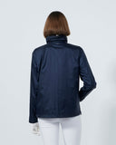 Person wearing a navy blue jacket on a white background