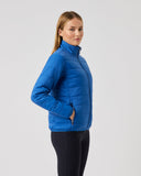 Woman wearing a blue jacket on a white background
