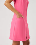 Pink dress worn by a person on a plain background