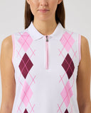 Woman wearing a sleeveless argyle pattern shirt with pink and purple diamonds on a white background