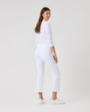 Person wearing a white outfit on a plain background