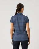 Woman wearing a blue patterned shirt on a white background