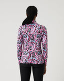Person wearing a pink and black patterned jacket on a white background