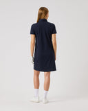 Woman wearing a navy blue dress on a white background