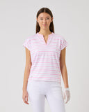Woman wearing a pink and white striped polo shirt on a light gray background