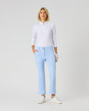 Daily Sports Flare Light Blue Ankle Pants in powder blue – women's slim-fit flare leg golf pants with double button waistband and side zip pockets, front view