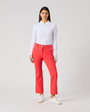 Daily Sports Flare Poppy Red Ankle Pants in bold poppy red – women's slim-fit flare leg golf pants with single logo button waistband and side zip pockets, front view