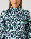 Daily Sports Flair Motion Printed Air Long Sleeve Top close-up of navy and mint wave print with quarter-zip collar detail