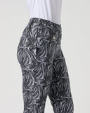 Daily Sports Printed Zebra Black Magic Pants close-up of black and white zebra swirl print, front pocket and ball marker detail