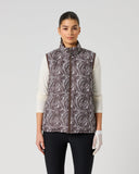 Women's reversible brown zebra wave print padded golf vest with full zip and stand-up collar – printed side front view
