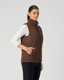 Women's reversible brown padded golf vest with full zip, zipped pockets, and stand-up collar – solid side view
