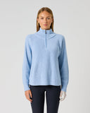 Women's light blue ribbed wool blend golf pullover with half zip and high collar – front view
