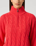Daily Sports Poppy Red Cable Pullover Unlined close-up of bold poppy red cable-knit pattern with quarter-zip ribbed stand collar and silver logo zipper pull detail