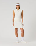 Daily Sports Madelene White Cable Knit Skort close-up of cream ivory cable-knit fabric with elasticated waistband and pleated skort silhouette detai