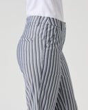 Daily Sports Stripe Dark Navy Pants close-up of navy and white vertical stripe fabric, front pocket and waistband detail
