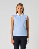 Daily Sports Light Blue Ribbed Sleeveless Top in powder blue – women's sleeveless golf top with white contrast mock neck collar, quarter-zip placket and tonal logo embroidery, front view on model