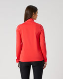 Daily Sports Poppy Red Piping Long Sleeve Half Neck Top in bold poppy red with white contrast piping – women's quarter-zip golf top, back view showing sleeve piping detail