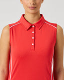 Daily Sports Poppy Red Piping Sleeveless Polo close-up of bold poppy red fabric with white contrast shoulder and side piping trim, classic polo collar and white button placket detail