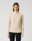 Women's cream textured wave structure long sleeve golf top with half zip and stand-up collar – front view
