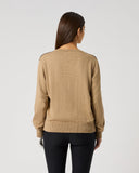 Women's camel argyle cotton cashmere golf pullover sweater with relaxed fit and ribbed hem – back view
