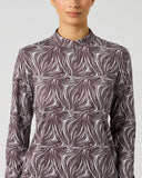 Daily Sports Dull Zebra Long Half Neck Shirt close-up of muted mauve and cream abstract zebra swirl print with mock neck stand collar and hidden half-zip placket detail