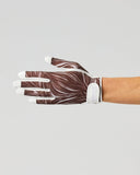 A human hand wearing a brown and white anatomical muscle-patterned glove, shown against a plain light gray studio background.