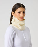 Daily Sports Hudson Ivory Neck Warmer in cream ivory – women's ribbed knit golf neck warmer snood styled over white zip-neck base layer, side view
